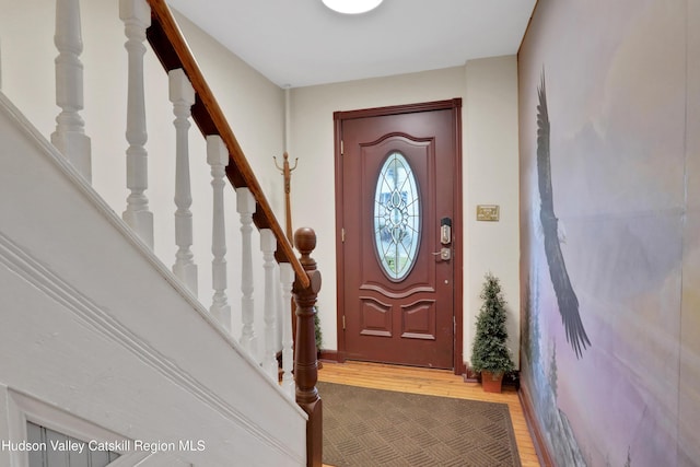 20-22 Milton Ave, Highland, NY 12528 - foyer entrance featuring stairs, light wood-style floors, and baseboards