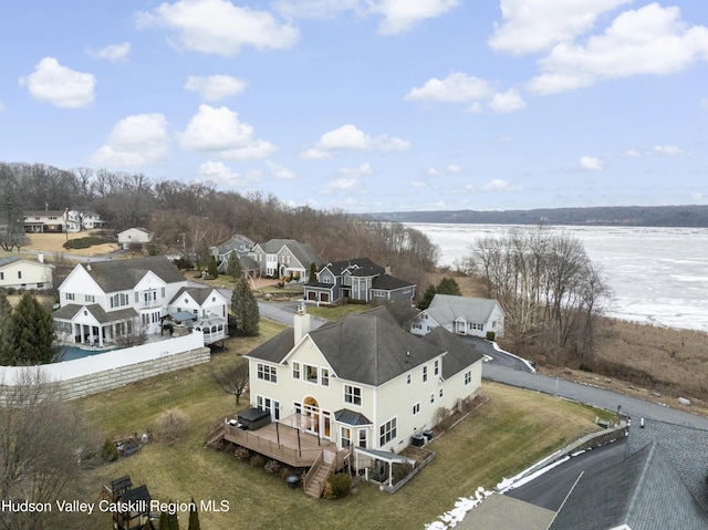 aerial view featuring a water view