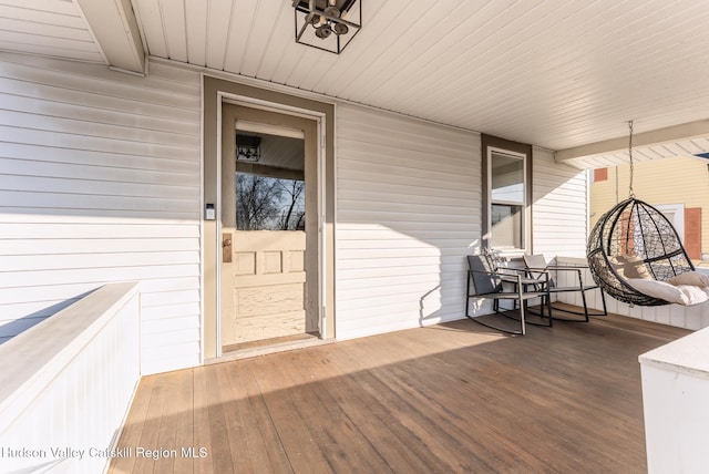 entrance to property with covered porch