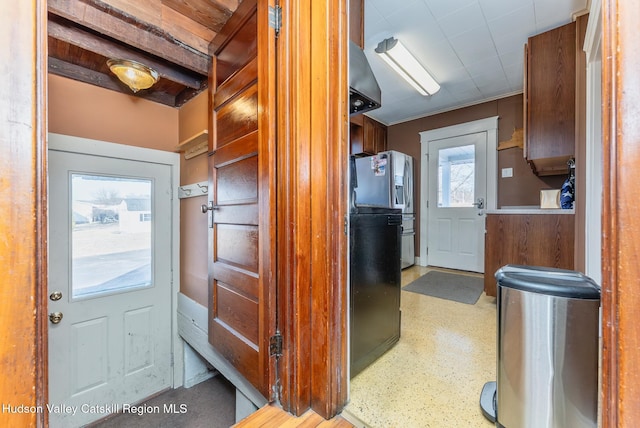 kitchen with refrigerator with ice dispenser