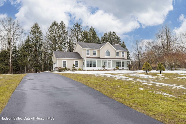 view of front of home with a front lawn