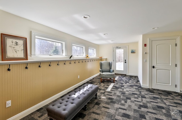 88 Gaby Ln, Hunter, NY 12442 - living area featuring dark colored carpet and baseboards