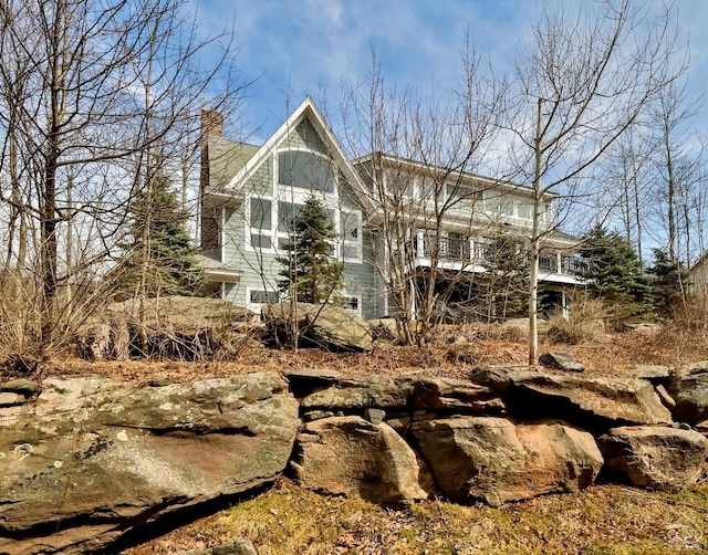 88 Gaby Ln, Hunter, NY 12442 - rear view of property with a chimney