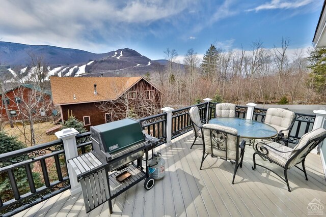 88 Gaby Ln, Hunter, NY 12442 - deck featuring a mountain view and outdoor dining area