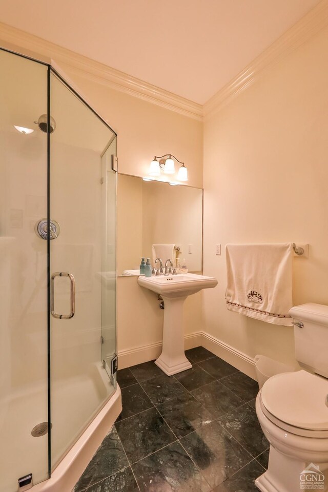 88 Gaby Ln, Hunter, NY 12442 - full bathroom featuring crown molding, baseboards, toilet, and a shower stall