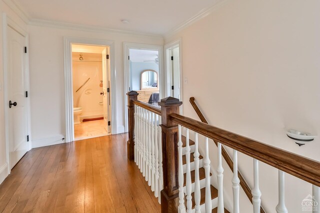 88 Gaby Ln, Hunter, NY 12442 - corridor featuring an upstairs landing, light wood-type flooring, ornamental molding, and baseboards