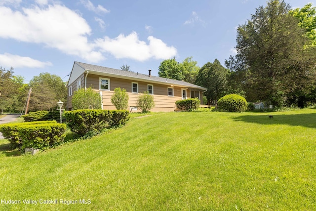 55 Harry Wells Rd, Saugerties, NY 12477 - back of property with a lawn