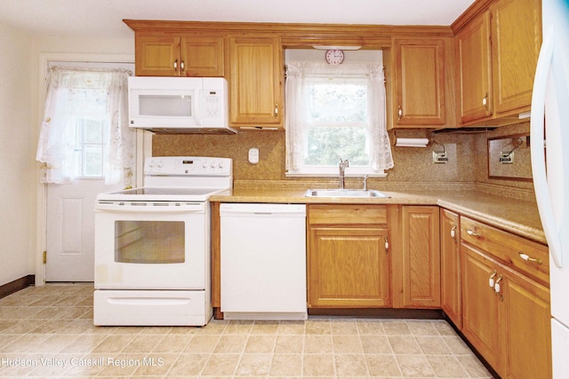 55 Harry Wells Rd, Saugerties, NY 12477 - kitchen featuring white appliances, a sink, decorative backsplash, and light countertops