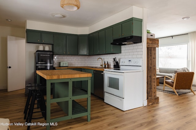 kitchen featuring wooden counters, light hardwood / wood-style floors, sink, black dishwasher, and white electric stove