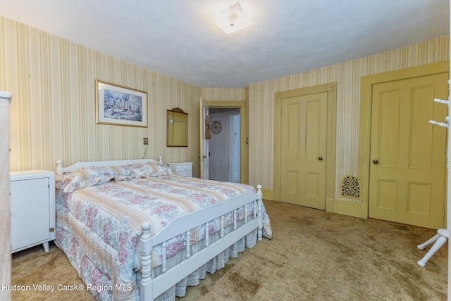 bedroom featuring carpet