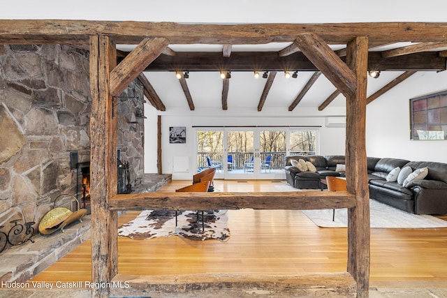 660-668 N Chodikee Lake Rd, Highland, NY 12528 - living room featuring wood finished floors