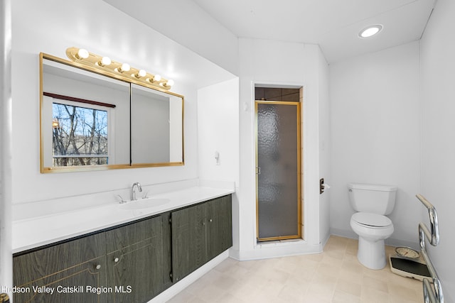 660-668 N Chodikee Lake Rd, Highland, NY 12528 - full bath with a stall shower, vanity, toilet, and baseboards