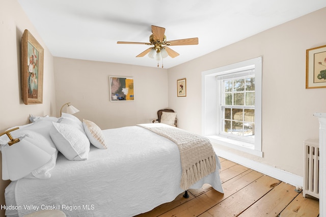 660-668 N Chodikee Lake Rd, Highland, NY 12528 - bedroom with light wood-style floors and a ceiling fan