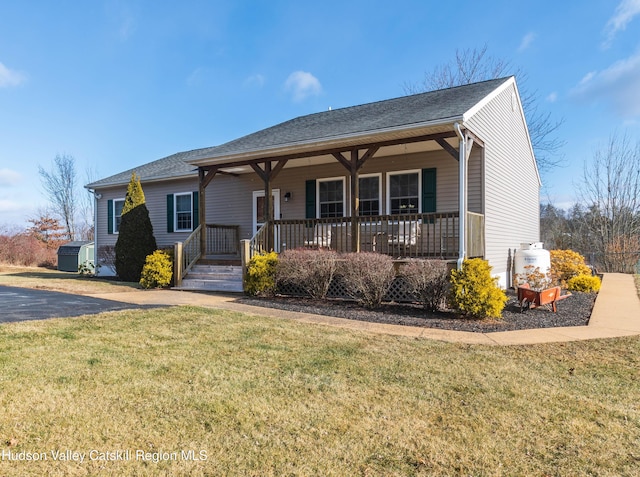 view of front of house featuring a front lawn and a porch