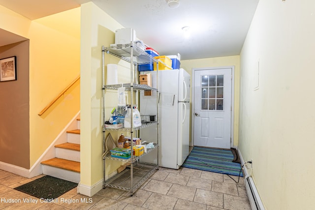 208 Paul Saxe Rd, Catskill, NY 12414 - laundry room featuring baseboards and baseboard heating