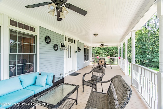 208 Paul Saxe Rd, Catskill, NY 12414 - porch with a ceiling fan and outdoor lounge area