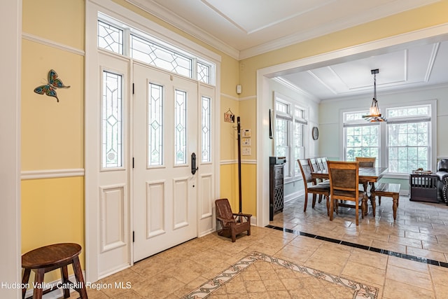 208 Paul Saxe Rd, Catskill, NY 12414 - foyer with inlaid floor details, crown molding, and healthy amount of natural light