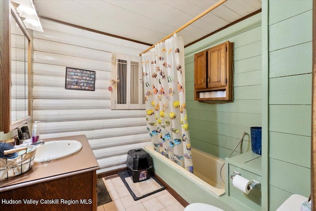 full bathroom with toilet, shower / tub combo, tile patterned floors, vanity, and wood walls