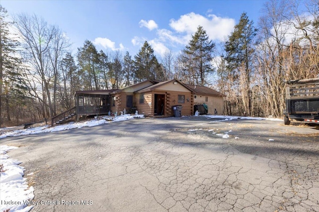 view of log cabin