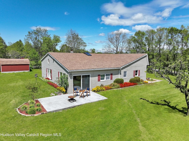 4947 Rte 32, Catskill, NY 12414 - back of house featuring a patio area, a lawn, and a shingled roof