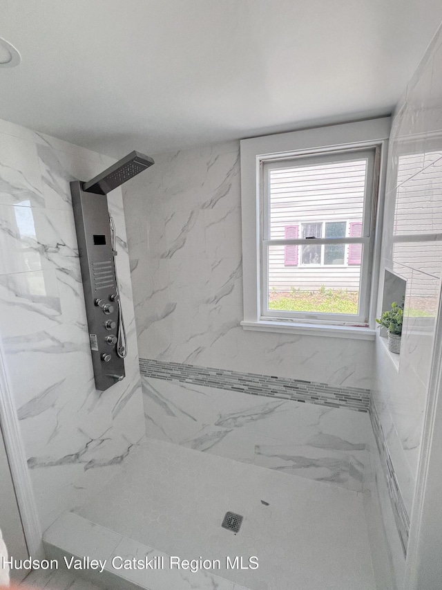 4947 Rte 32, Catskill, NY 12414 - bathroom featuring a marble finish shower and marble look tiles