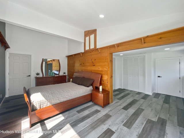 4947 Rte 32, Catskill, NY 12414 - bedroom with a closet, wood finished floors, high vaulted ceiling, recessed lighting, and wooden walls