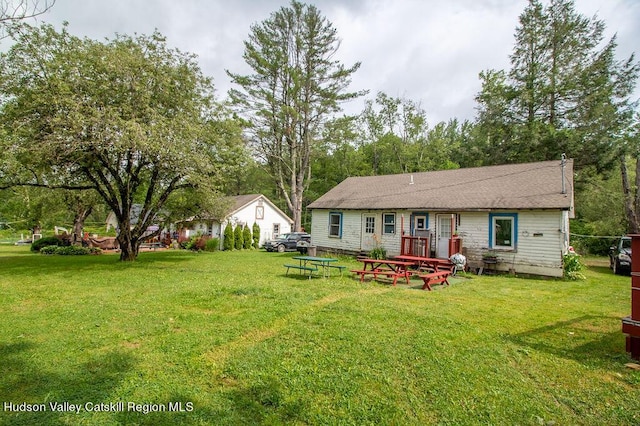 exterior space with a yard