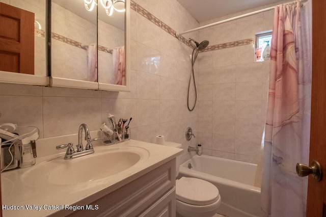 full bathroom with decorative backsplash, toilet, tile walls, and shower / bath combo with shower curtain