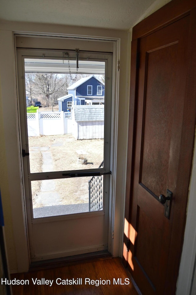 entryway featuring dark wood-type flooring