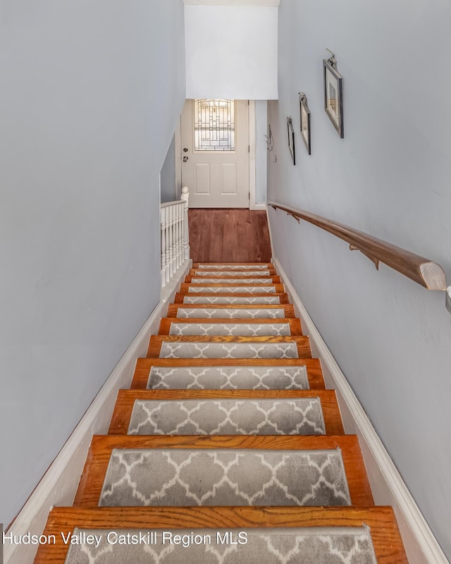 stairway with baseboards