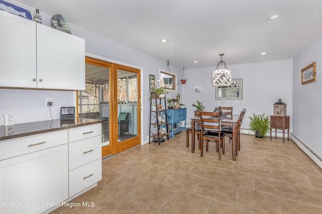 dining area featuring light tile patterned floors and recessed lighting