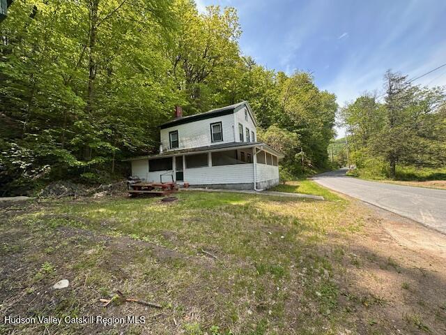 818 Cauterskill Rd, Catskill, NY 12414 - view of front of property featuring a wooded view