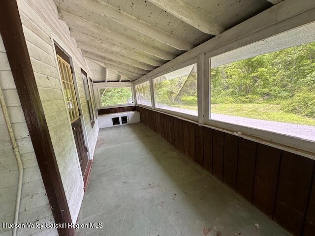 818 Cauterskill Rd, Catskill, NY 12414 - unfurnished sunroom with lofted ceiling