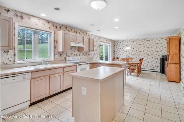 825 County Route 403, Greenville, NY 12083 - kitchen featuring white appliances, wallpapered walls, a sink, under cabinet range hood, and light countertops