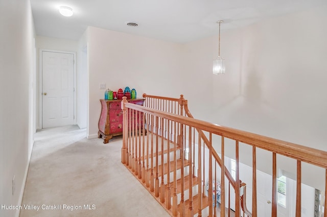 825 County Route 403, Greenville, NY 12083 - corridor with an upstairs landing, light carpet, and baseboards