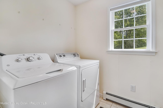 825 County Route 403, Greenville, NY 12083 - laundry area featuring baseboard heating, washing machine and dryer, and light tile patterned flooring