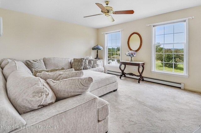 825 County Route 403, Greenville, NY 12083 - living area featuring ceiling fan, carpet, and baseboard heating