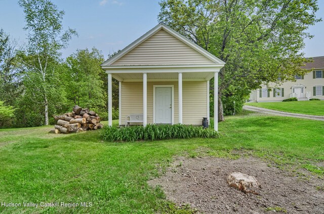 825 County Route 403, Greenville, NY 12083 - view of front of house with a porch and a front lawn