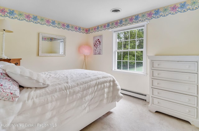 825 County Route 403, Greenville, NY 12083 - bedroom with a baseboard heating unit and light colored carpet