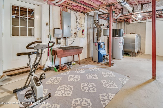 825 County Route 403, Greenville, NY 12083 - unfinished below grade area with electric panel, oil tank, water heater, and a heating unit