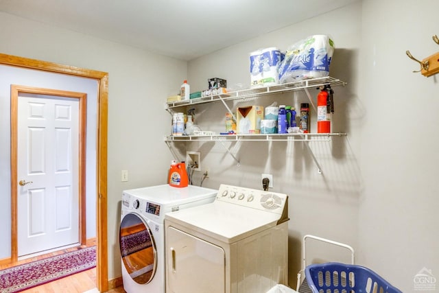 220 Botti Dr, Hunter, NY 12442 - washroom with washer and dryer and light wood finished floors
