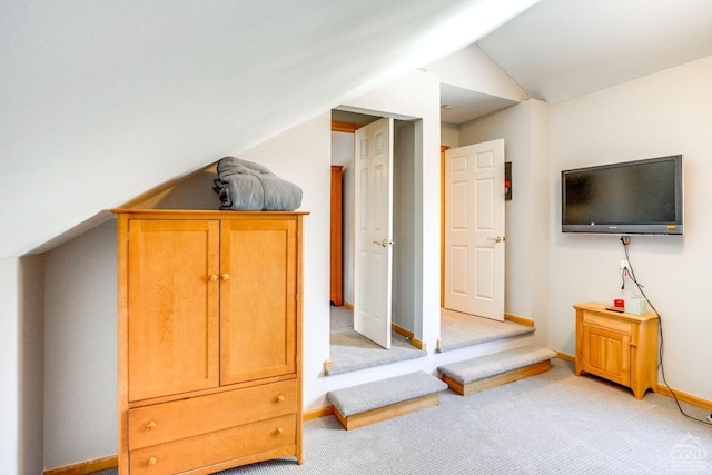 220 Botti Dr, Hunter, NY 12442 - bedroom featuring lofted ceiling, light carpet, and baseboards