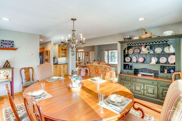 220 Botti Dr, Hunter, NY 12442 - dining area with a chandelier, recessed lighting, light wood finished floors, and baseboards