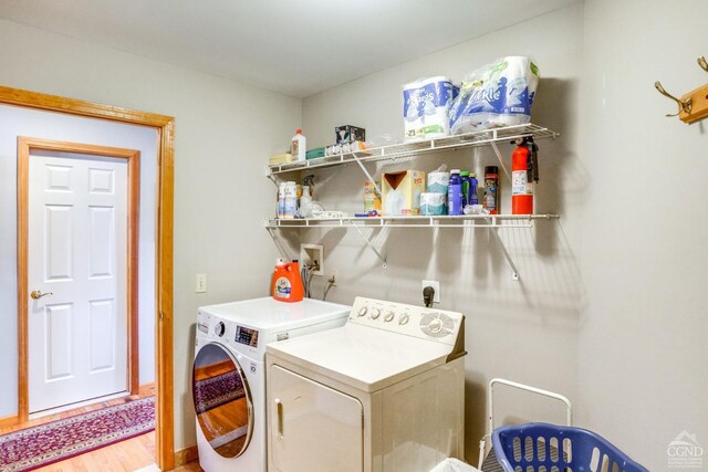 220 Botti Dr, Hunter, NY 12442 - washroom with washer and dryer and light wood finished floors