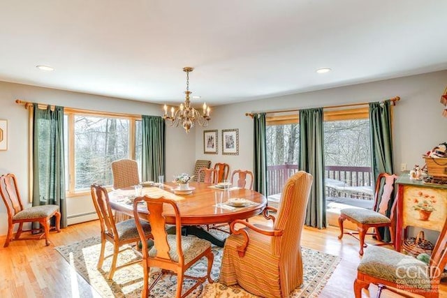 220 Botti Dr, Hunter, NY 12442 - dining room with a chandelier, light wood-type flooring, recessed lighting, and a baseboard radiator