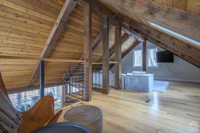 bonus room featuring wood ceiling and hardwood / wood-style floors