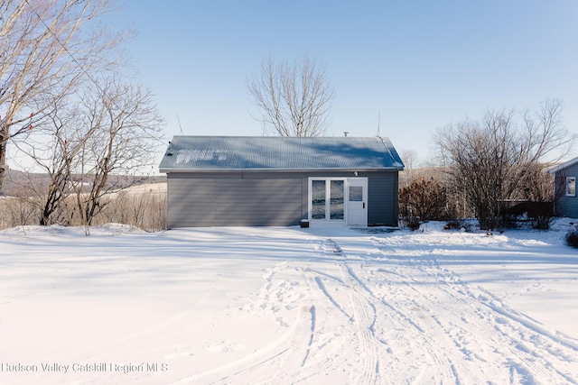 view of snow covered house