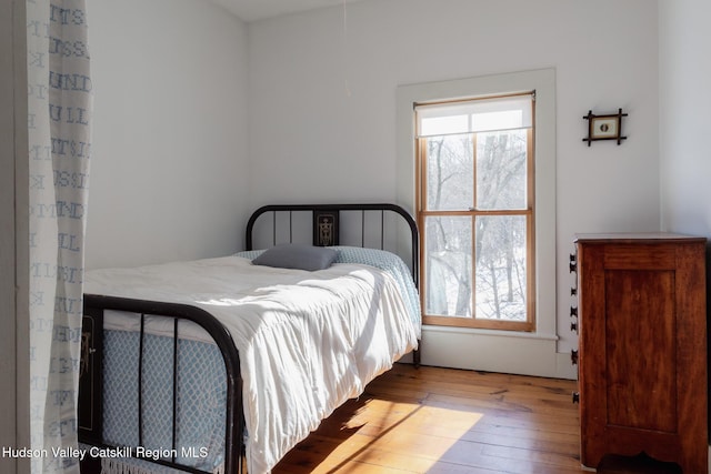 bedroom featuring light hardwood / wood-style flooring