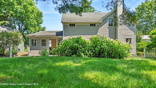 7 Paul Ave, Hudson, NY 12534 - back of property with a chimney and roof with shingles