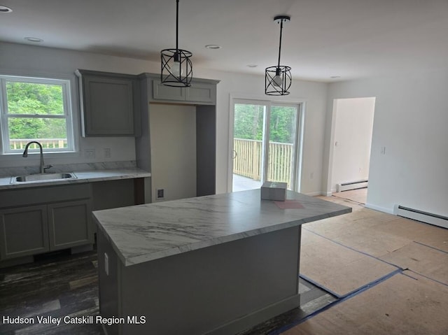 4791 US Highway 209, Accord, NY 12404 - kitchen with a baseboard heating unit, a kitchen island, hanging light fixtures, recessed lighting, and gray cabinetry